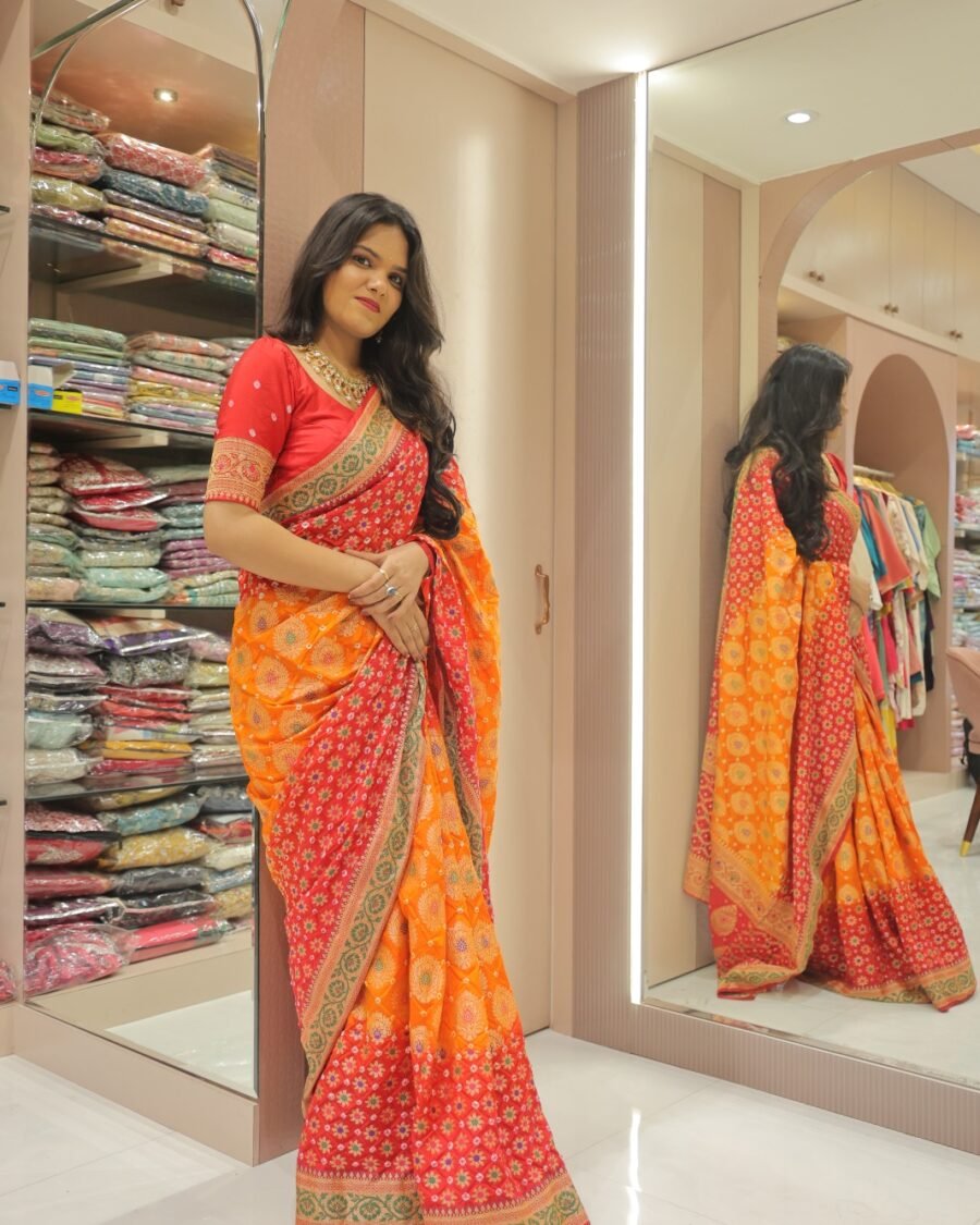Radiant Orange & Red Bandhani Style Saree with Zari Border